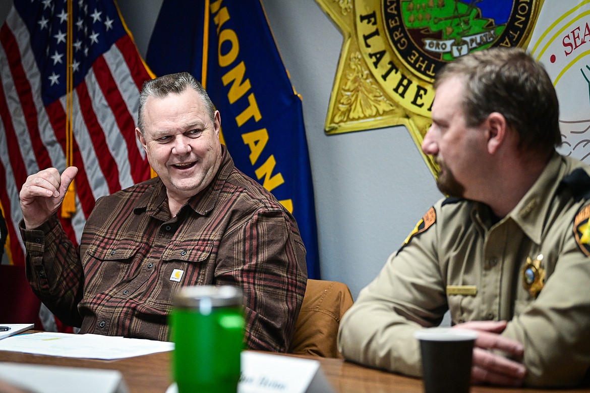 U.S. Senator Jon Tester speaks during a roundtable discussion on crime prevention, fentanyl trafficking and border security efforts with Flathead County Sheriff Brian Heino, right, Whitefish Police Deputy Chief Kevin Conway, Kalispell Police Chief Jordan Venizio, Lincoln County Sheriff Darren Short and Columbia Falls Police Chief Clint Peters at the Flathead County Sheriff's Office in Kalispell on Friday, March 15. (Casey Kreider/Daily Inter Lake)