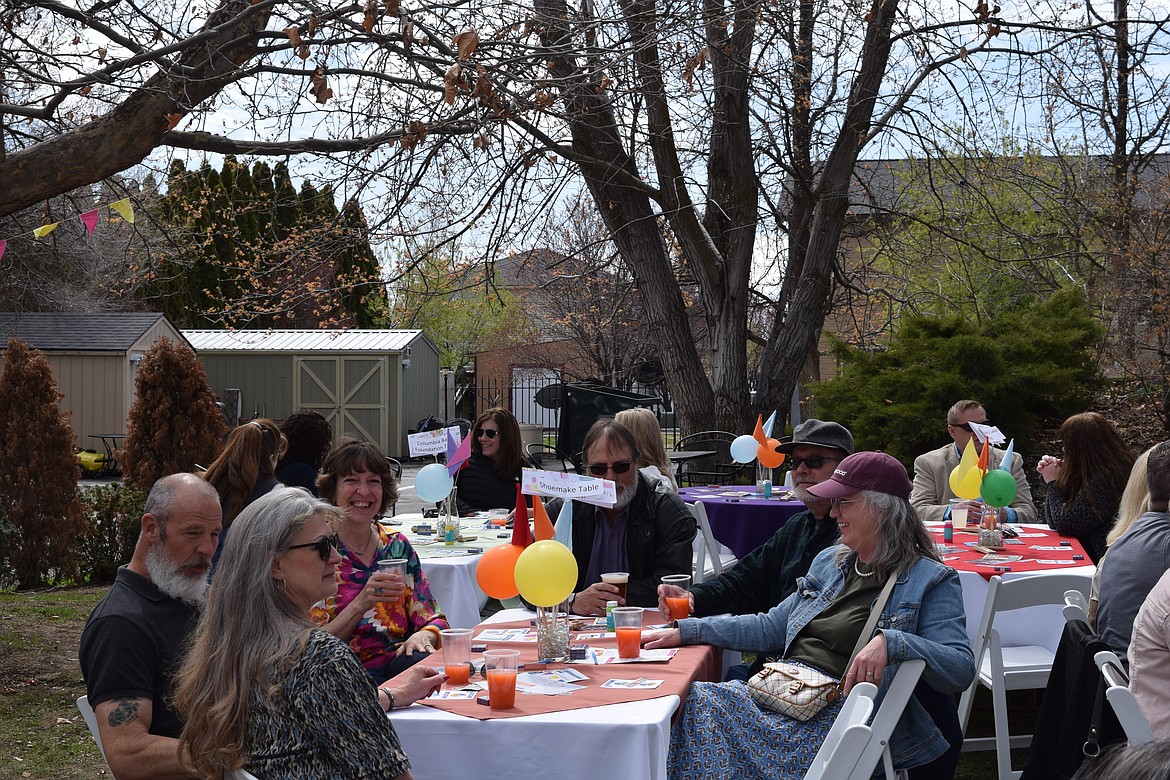 Diners enjoy refreshments and visit during the Columbia Basin Allied Arts Birthday Party fundraiser last April. The event was held at Jamison’s Event Center in Moses Lake, now known as The Garden, which will host this year’s event May 11 from 12 p.m. to 4 p.m.