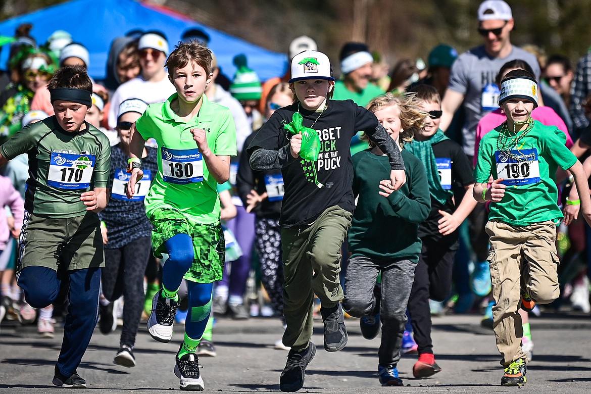 Kids race off the starting line during the fun run at Cloverfest in Columbia Falls on Saturday, March 16. (Casey Kreider/Daily Inter Lake)