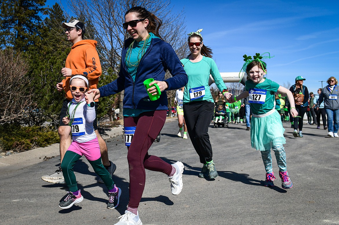 Participants race off the starting line during the fun run at Cloverfest in Columbia Falls on Saturday, March 16. (Casey Kreider/Daily Inter Lake)