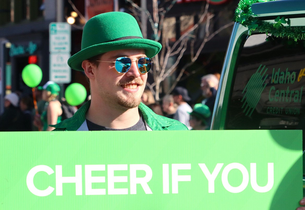 Gabe Thomas with Idaho Central Credit Union joins the St. Patrick's Day Parade.