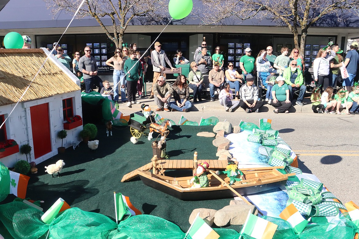 The All Things Irish float passes by the crowd during Saturday's St. Patrick's Day Parade.