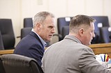 Former trooper on trial for murder arrested at airport