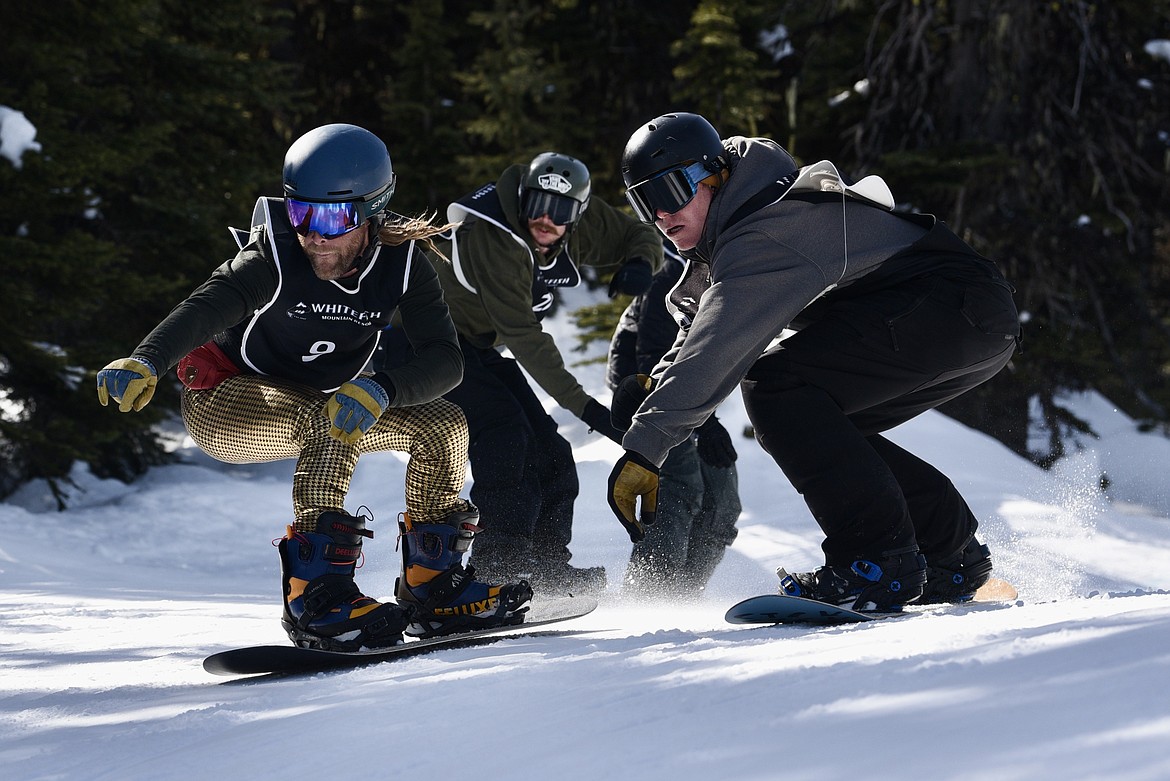 Snowboarders compete in the Nate Chute boardercross races at Whitefish Mountain Resort on Sunday, March 17, 2024. (Matt Baldwin/Whitefish Pilot)