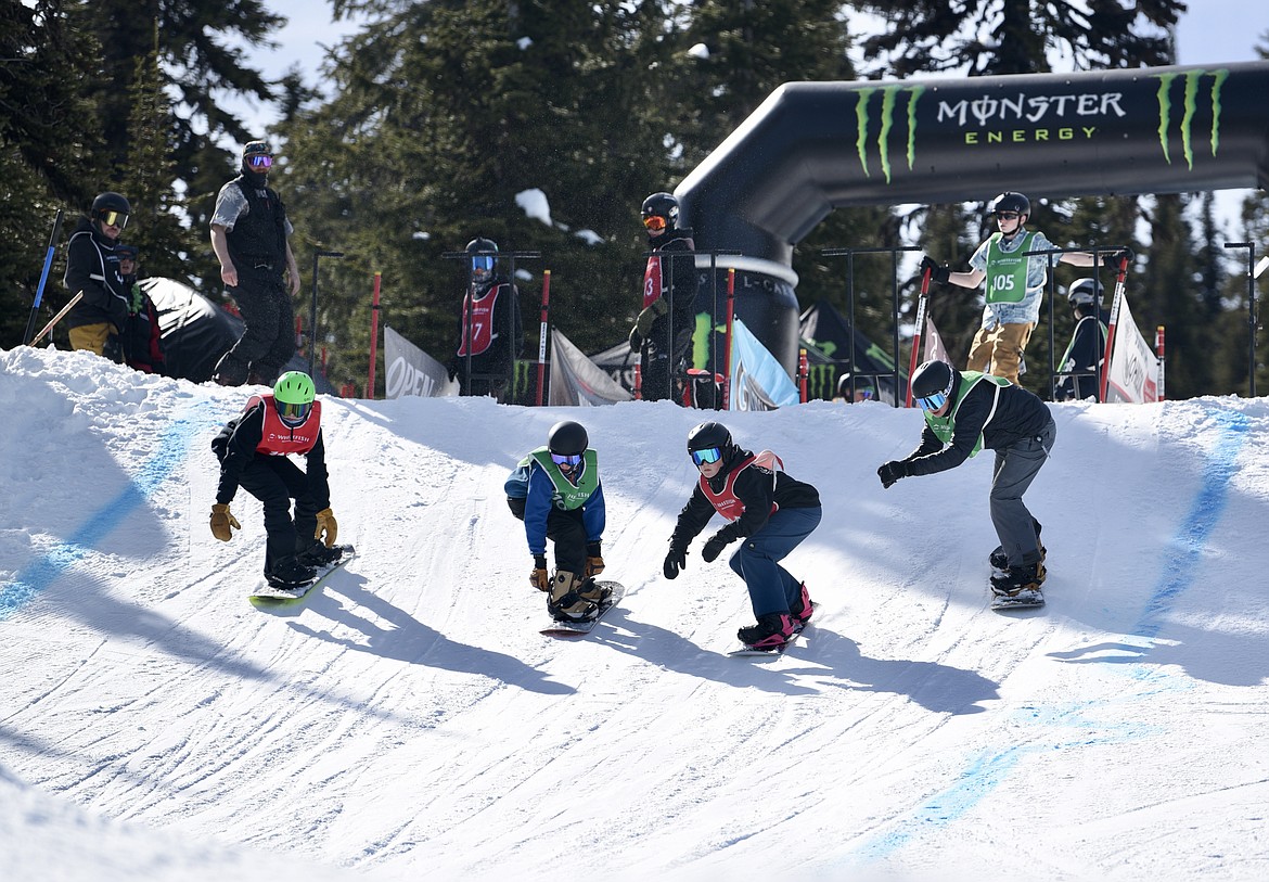 Snowboarders compete in the Nate Chute boardercross races at Whitefish Mountain Resort on Sunday, March 17, 2024. (Matt Baldwin/Whitefish Pilot)