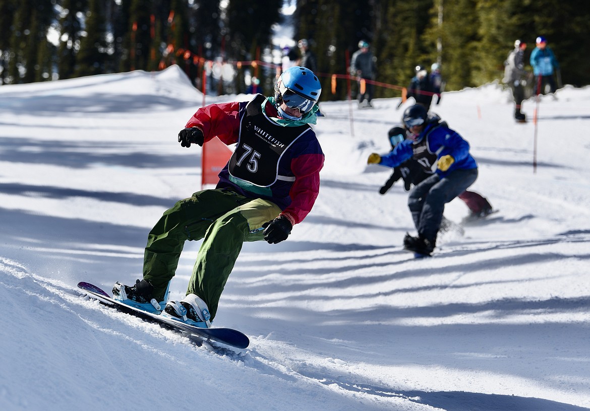 Snowboarders compete in the Nate Chute boardercross races at Whitefish Mountain Resort on Sunday, March 17, 2024. (Matt Baldwin/Whitefish Pilot)