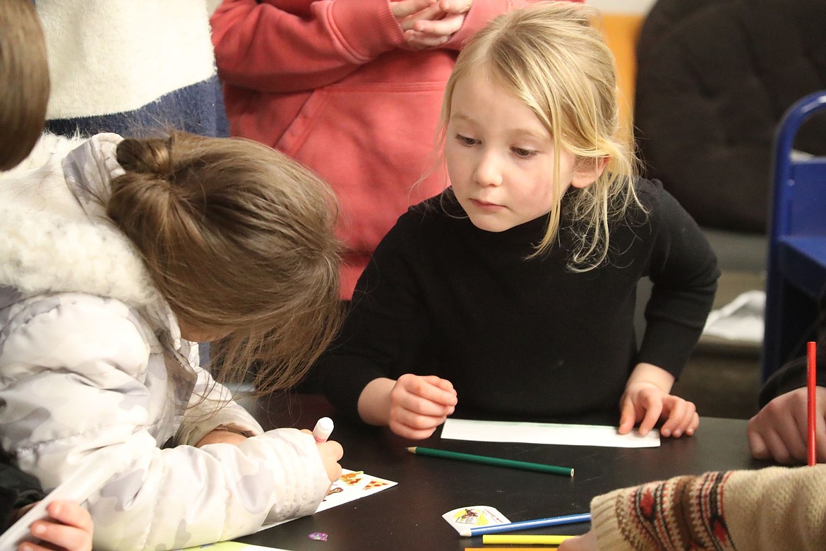 Suzanne Davis, East Bonner County Library youth services librarian, said the library put out a large display of picture books, provided hot chocolate, and supplied materials to make bookmarks.