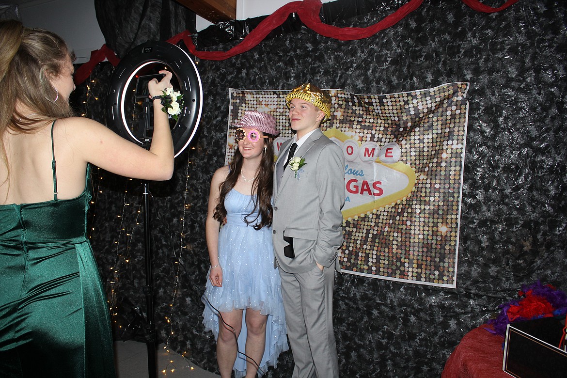 Students pose for photos at the Superior High School prom. (Monte Turner/Mineral Independent)