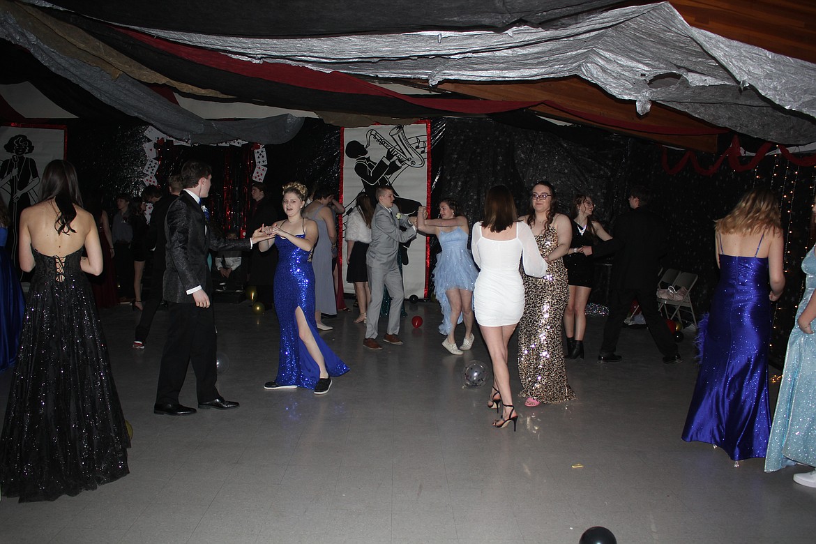 Students dance at the Superior High School prom. (Monte Turner/Mineral Independent)