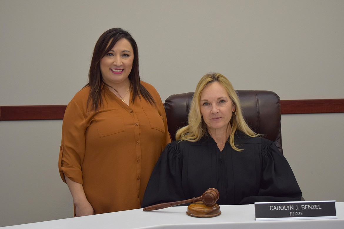 Othello Municipal Court Clerk Administrator Jessica Melo, left, and Municipal Judge Carolyn J. Benzel, right, sit inside the Othello City Hall council chambers, which has doubled as the city’s courtroom since the court’s establishment at the beginning of 2023.