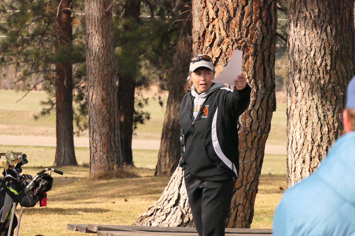 Plains golf coach Lisa Brown goes over course rules prior to last year's Plains Invitational tournament.  The 2024 version of Plains High golf gets underway this Friday with a three team meet (Superior, Plains, T Falls) this Friday afternoon at Wild Horse Golf Course north of Plains.  (Chuck Bandel/VP-MI)