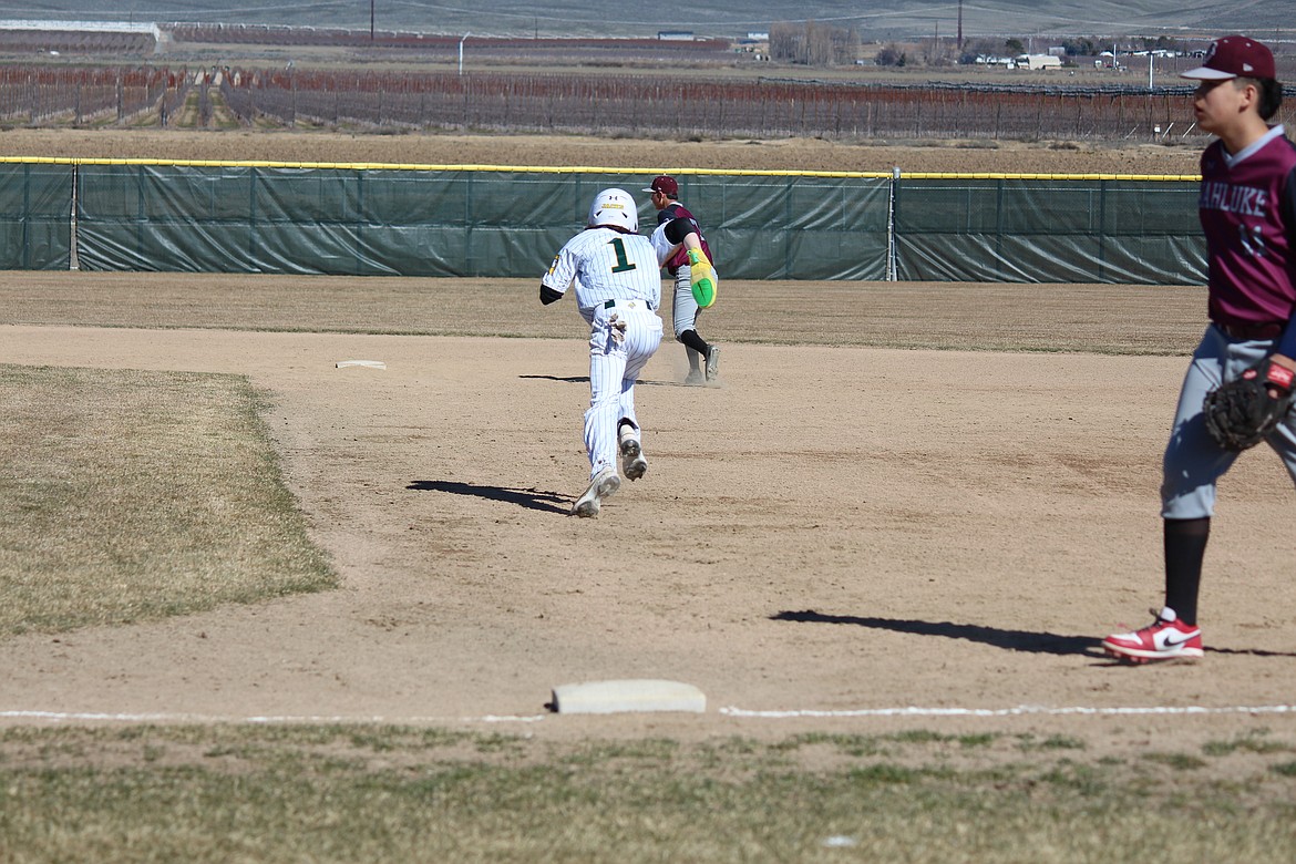 Quincy’s Caleb Coduti (1) breaks for second base in the Jacks’ doubleheader sweep of the Wahluke Warriors Saturday.