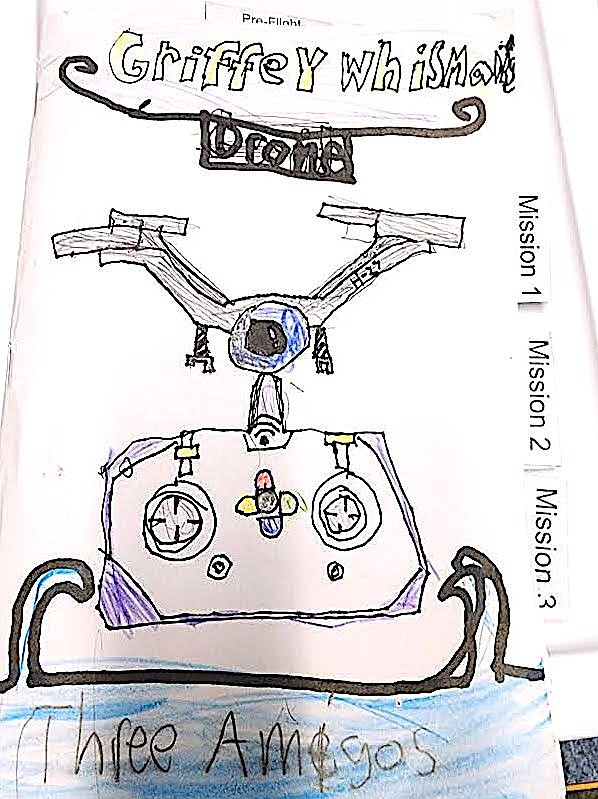 Each child in Tami Morrison's STEAM class has a drone flight book with Missions and flight practices/exercises to complete for each Mission. (Berl Tiskus/Leader)