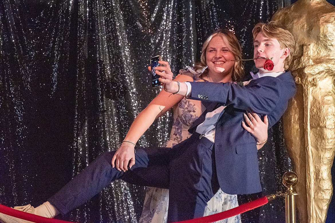 Jolie Friar dips Quinn Clark, later crowned Prom King, during Grand March at the Little Theater Saturday, March 16.