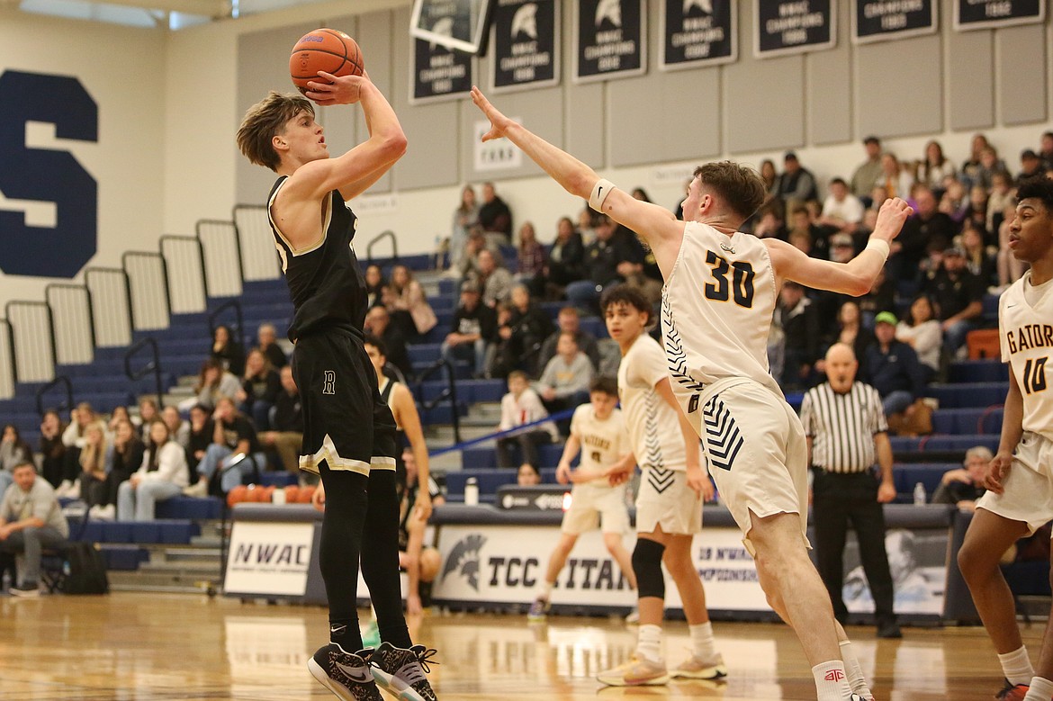 Royal senior Caden Allred, left, takes a shot against Annie Wright during a game in the 1A Boys State Basketball Tournament. Allred was selected to the 1A all-state team by the Washington Interscholastic Basketball Coaches Association.