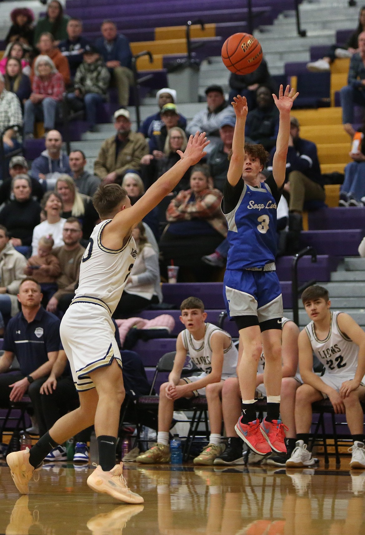 Soap Lake senior Trey Landdeck (3) shoots a three-pointer during a game against MLCA/CCS. Landdeck was one of two Basin basketball players selected to the 1B all-state team.