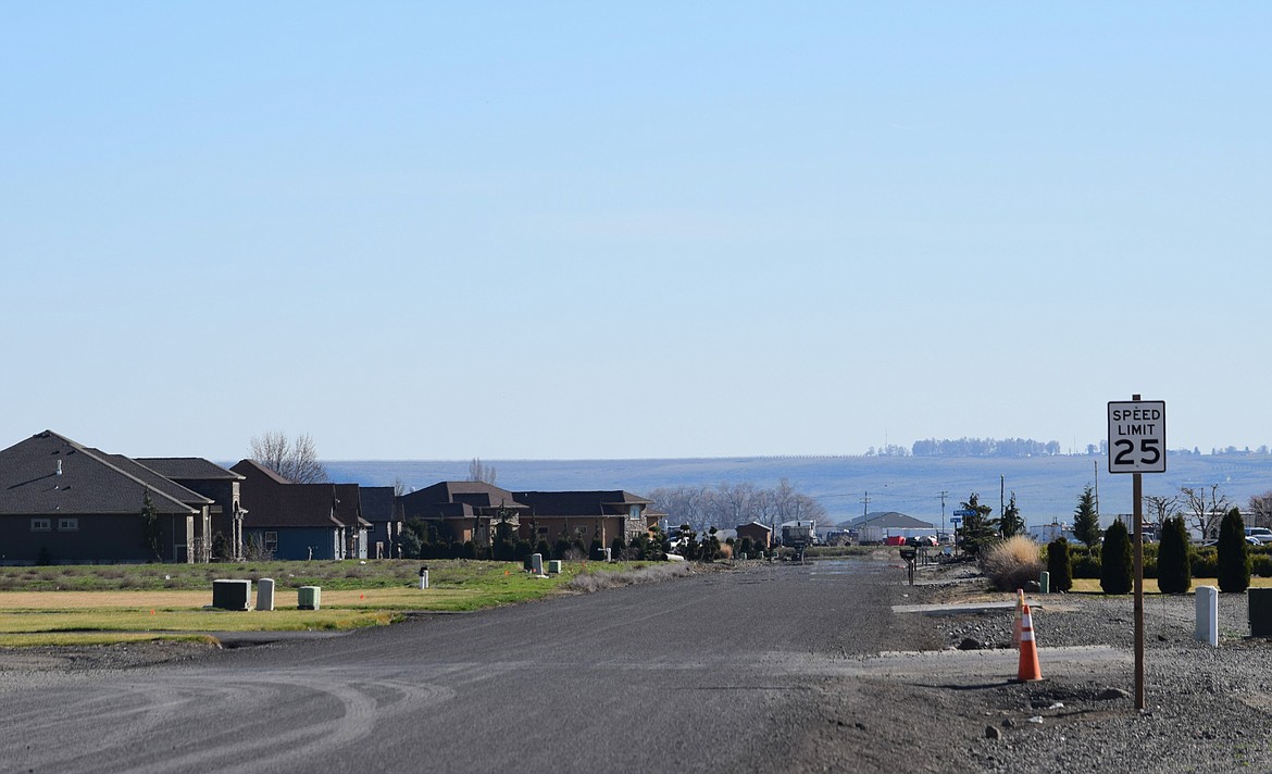 Neighborhoods and subdivisions in Adams County, such as the pictured houses south of Othello off of West Bench Road, will benefit from the county’s $10.3 million grant to install infrastructure for high-speed fiber optic in Ritzville, Lind and outside of Othello’s city limits.