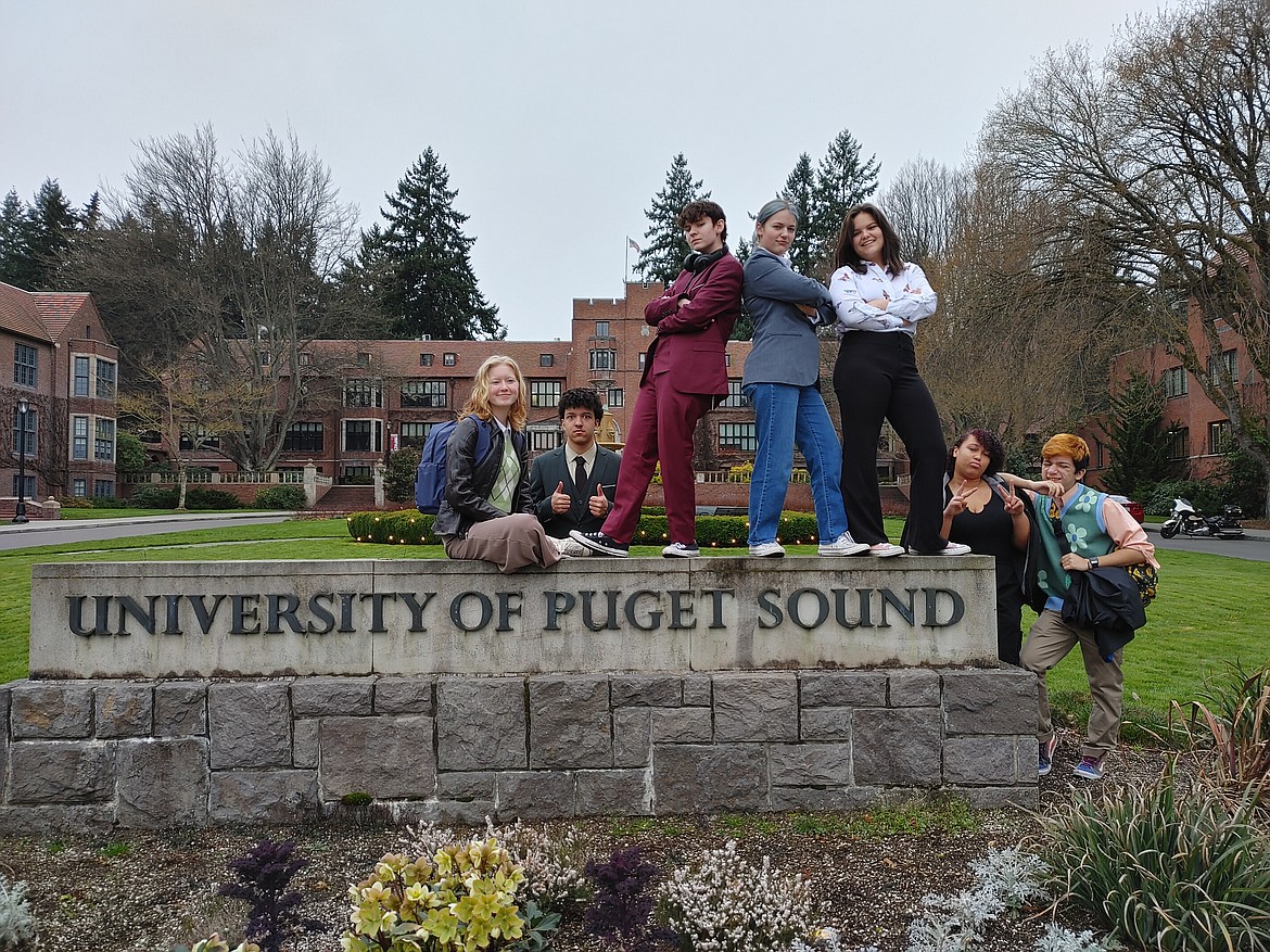 The seven state competitors from the Moses Lake High School speech team pose for a picture at the competition venue.