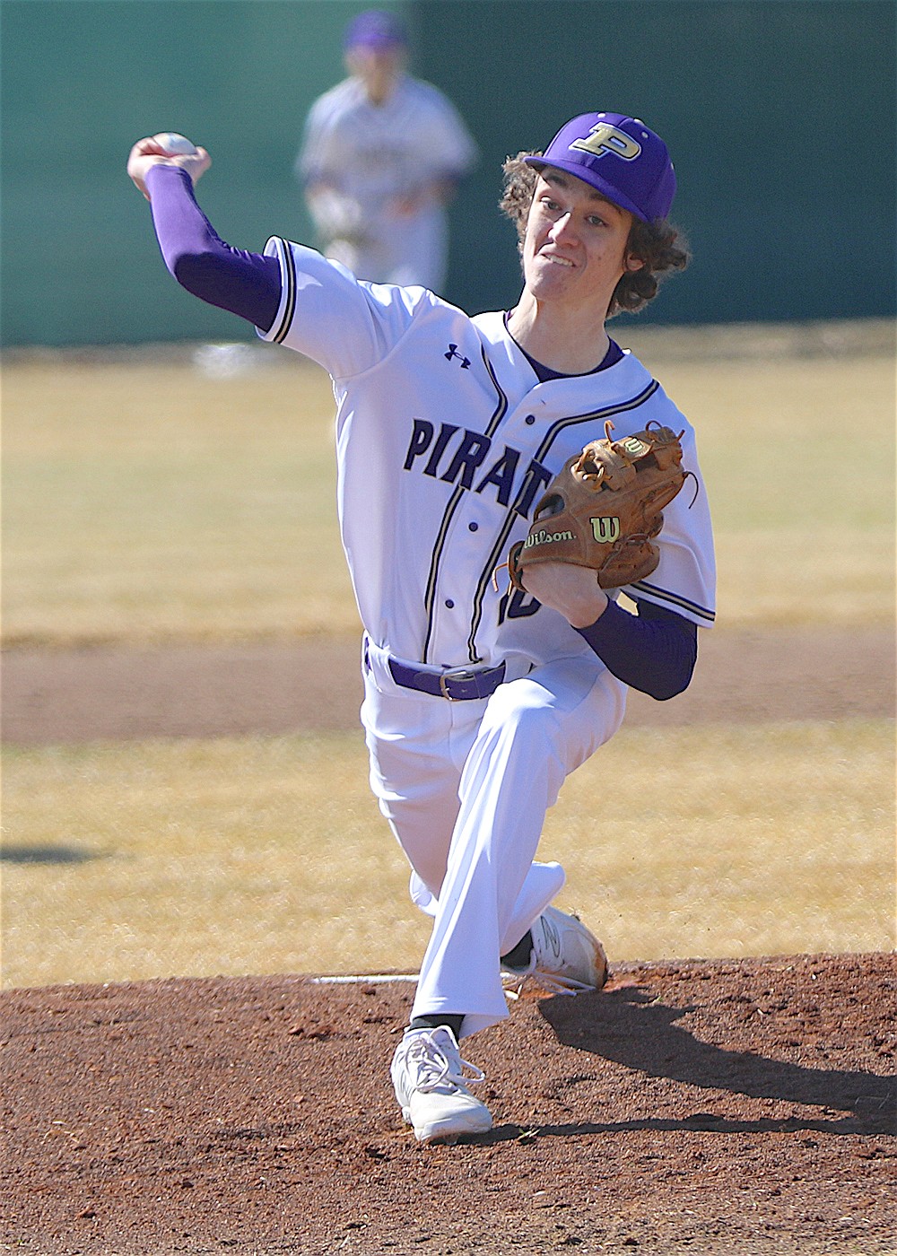 Pirate pitcher George Wyman opens season last Friday against Whitefish Bulldogs. (Bob Gunderson photo)