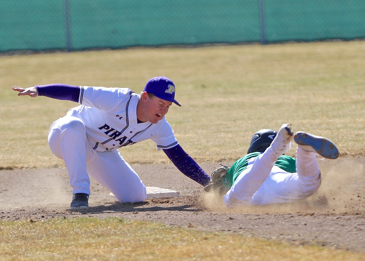 Pirate Wyatt Wilson tags out Belgrade runner on second during Saturday's matchup. (Bob Gunderson photo)