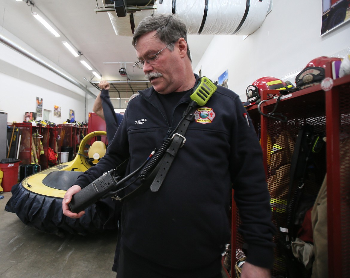 Hauser Lake Fire Protection District Chief James Neils discusses the importance of radios for firefighting Tuesday at the fire station in Hauser. The volunteer department will be asking residents in its district to go to the polls in May for a levy reset that, if approved, would help fund operations and keep Hauser Fire's budget on pace with rising costs.