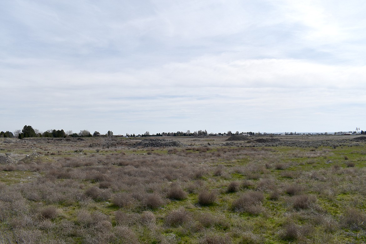 Grant County officials are still working on the land use designation process for property at the intersection of Road N NE and Westshore Drive NE, pictured. The land will be the site of the Moses Lake School District’s 12th elementary school.