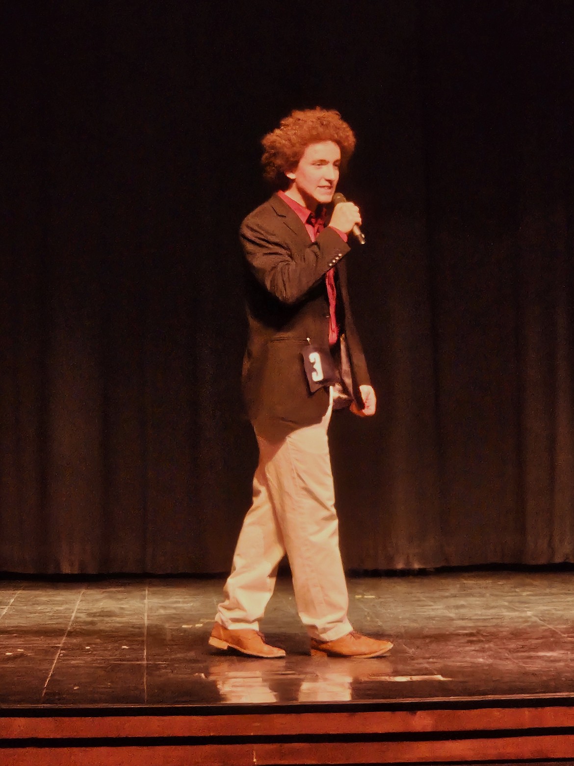 Chandler Swanson shares his gift of impressions during the talent portion of Mr. BFHS. He finished as first runner up.