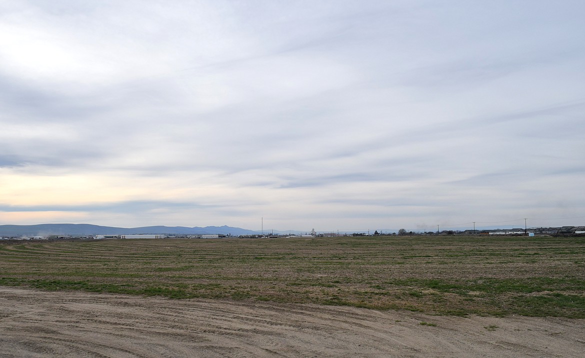 The Port of Othello owns about 75 acres of land, pictured, bordering state Route 26, southwest of the intersection of 14th Avenue and SR 26. The port is currently holding the land for the eventual sale to developer Meritage Companies.