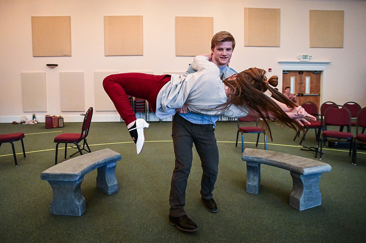 Gideon Holcomb as Rolf Gruber spins Cheyenne Szymoniak as LIesl von Trapp during the Homeschool Theater Club's rehearsal of "The Sound of Music" at Valley Life Church in Columbia Falls on Friday, March 22. (Casey Kreider/Daily Inter Lake)