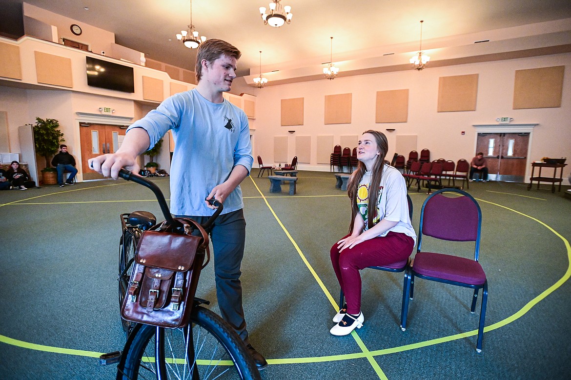 Gideon Holcomb plays Rolf Gruber and Cheyenne Szymoniak plays LIesl von Trapp during the Homeschool Theater Club's rehearsal of "The Sound of Music" at Valley Life Church in Columbia Falls on Friday, March 22. (Casey Kreider/Daily Inter Lake)