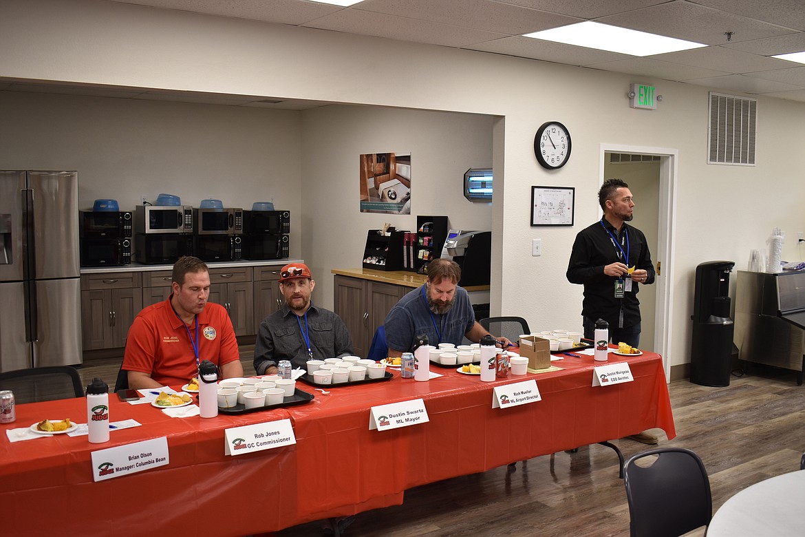 Judges savor the samples at Greenpoint Technologies’ chili cookoff Thursday. From left: Grant County Commissioner Rob Jones, Moses Lake Mayor Dustin Swartz, Moses Lake Airport Director Rich Mueller and AeroTec Chief Operating Officer Justin Morigeau.