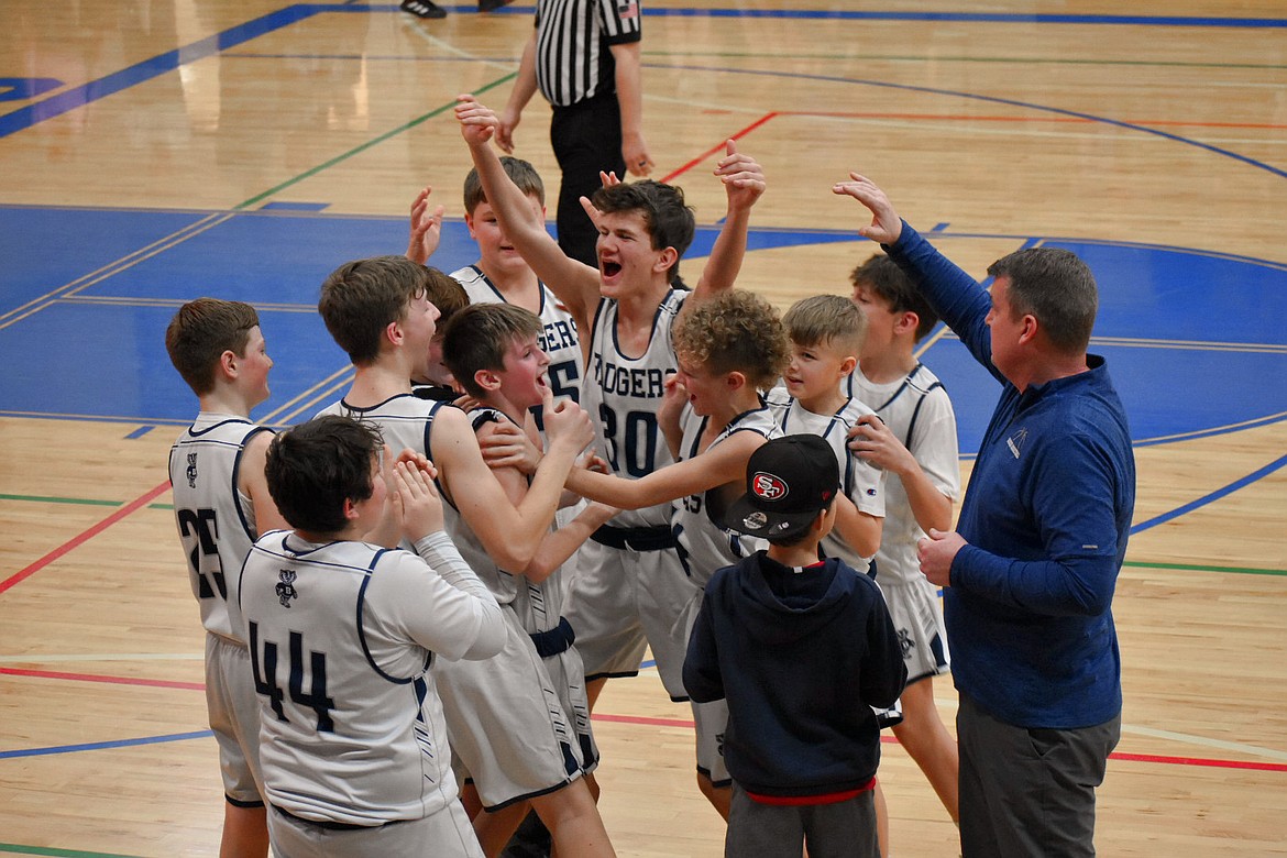 Seventh grade boys celebrate victory at the 76th Annual Bonners Ferry Tournament.