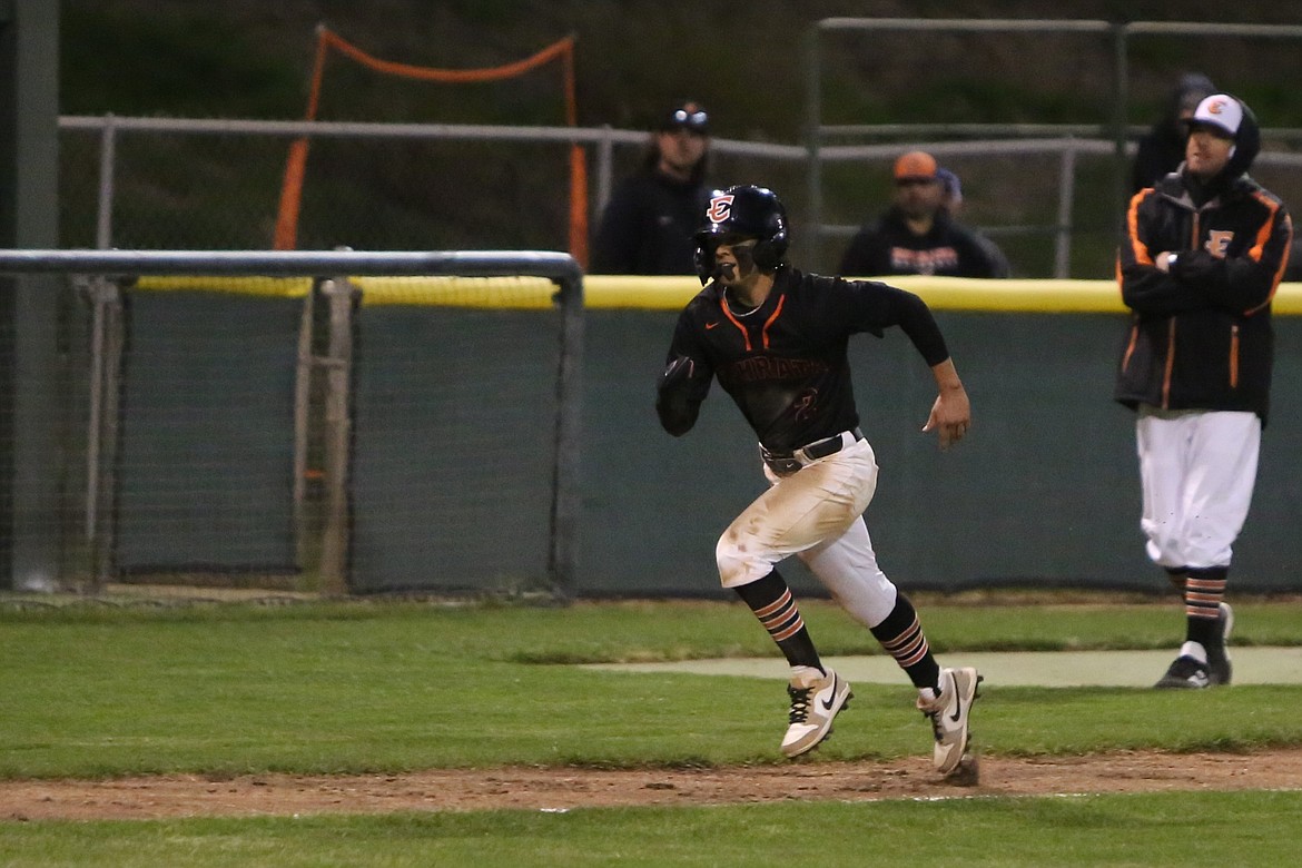 Ephrata senior AJ Glenn Jr. (2) runs home during the Tigers’ 8-4 win over East Valley (Yakima) on Friday.