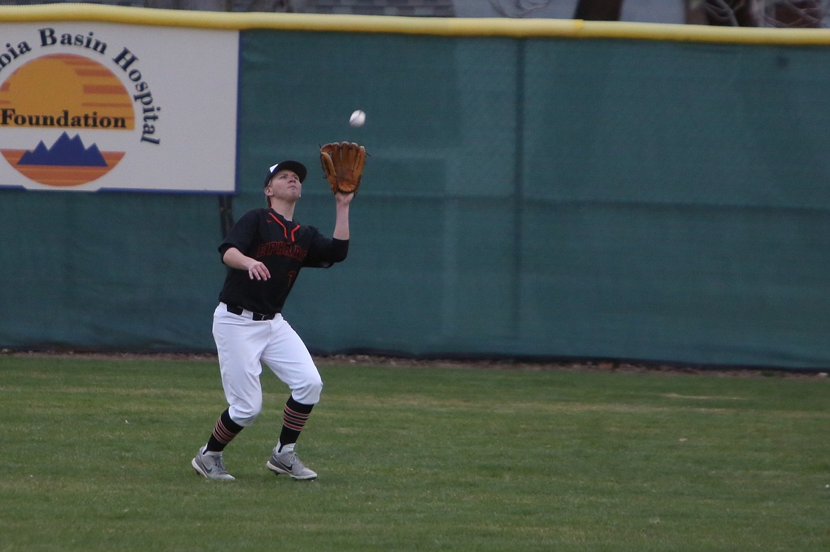 Ephrata senior Hayden Wurl catches a fly ball in right field.