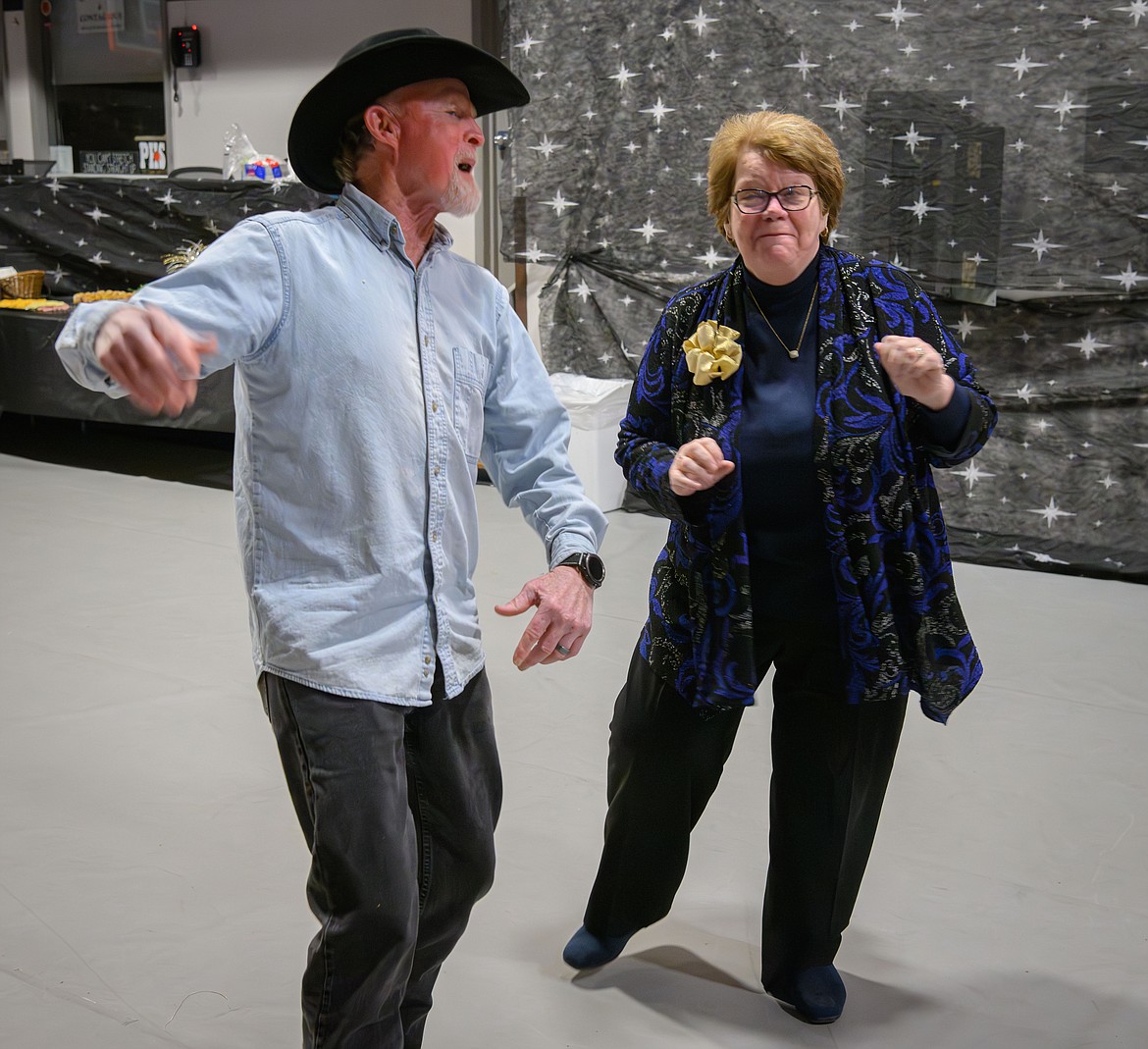 Dancing started off slow until Plains Superintendent Kathleen Walsh got things going with Pat Cleveland. (Tracy Scott/Valley Press)