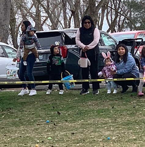 Children and their attendant grownups wait to descend on a field full of plastic eggs at the Grant County Animal Outreach Easter egg hunt at Blue Heron Park Saturday.