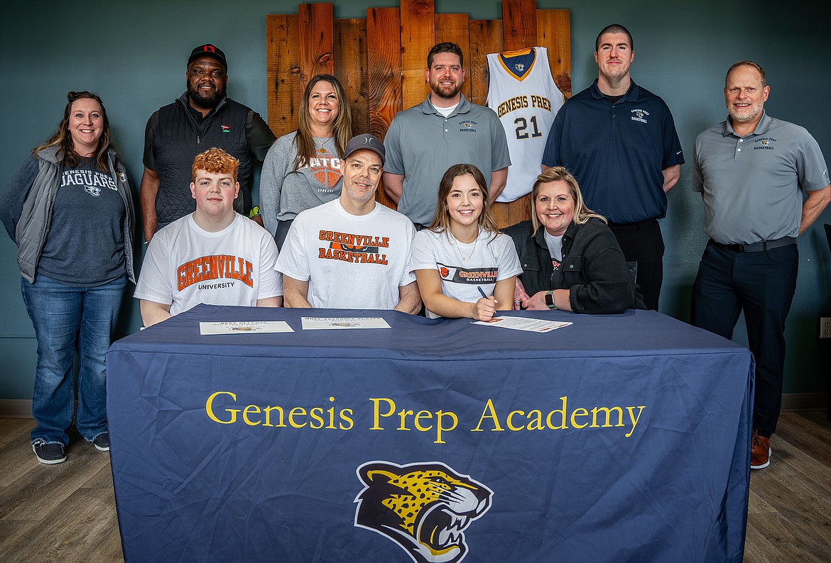 Courtesy photo
Genesis Prep senior Katie Yount recently signed a letter of intent to play basketball at NCAA Division III Greenville (Ill.) University. Seated from left are Robin Yount (brother), Sean Yount (dad), Katie Yount and Heidi Yount (mom); and standing from left, Jessica Whaley, Genesis Prep athletic director and former girls basketball coach; Frank Morton, trainer; Amy Swannack, AAU coach; Nate Frisbie, Genesis Prep head girls basketball coach; Phillip Schmidts, Genesis Prep assistant girls basketball coach; and Jasson Lamb, Genesis Prep assistant girls basketball coach.