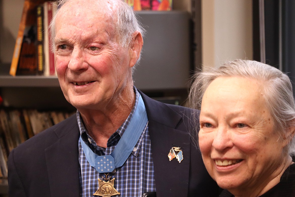 Thomas Norris and Heidi Baker pose for pictures following a ceremony at the Veteran Affairs North Idaho Community Clinic in Coeur d’Alene on Monday, National Medal of Honor Day.