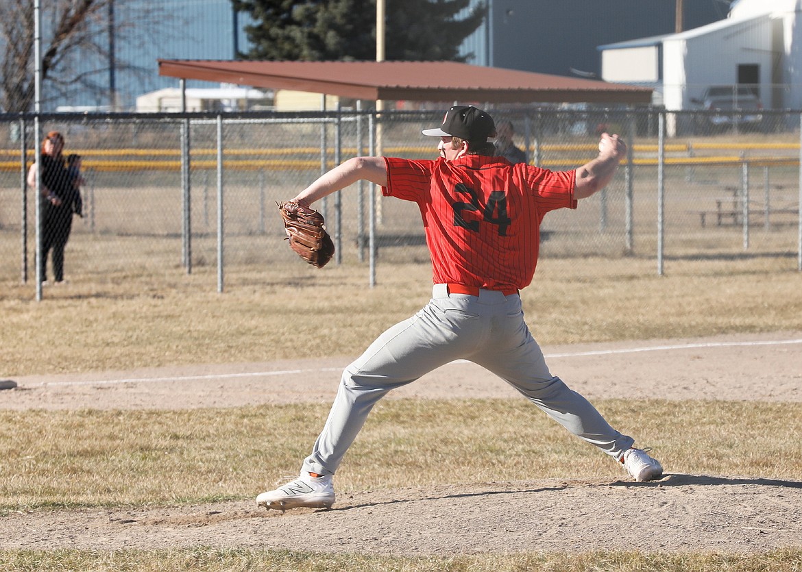 Ronan pitcher Tristan Fisher puts one across the plate during last Monday's season opener against Bigfork. (Susan Lake photo)