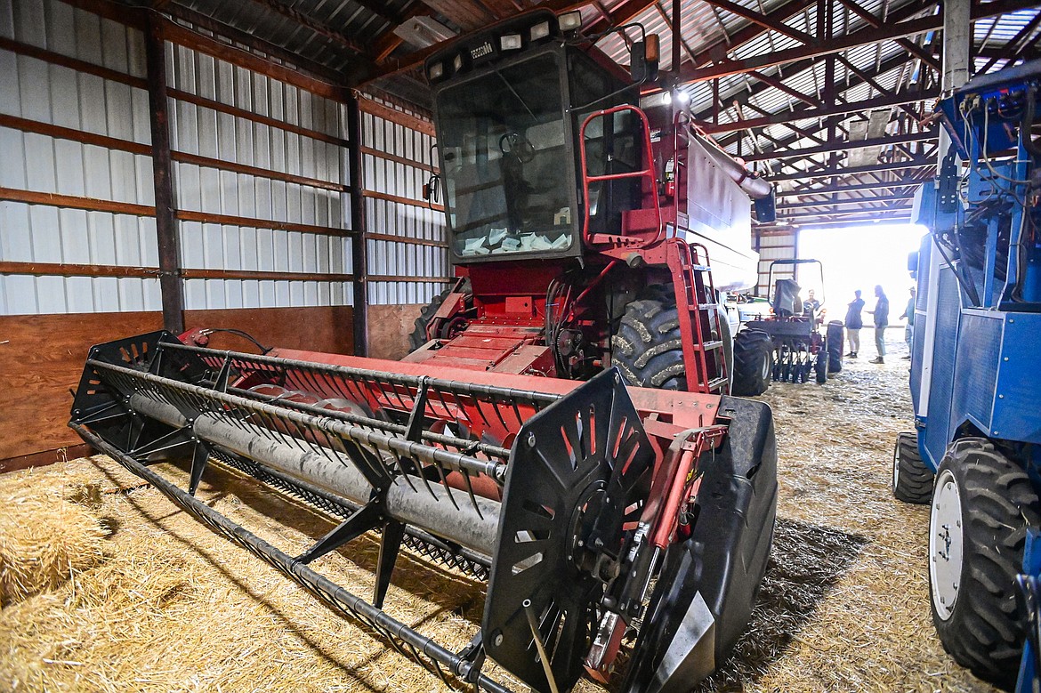 A Case International combine waits for harvest season inside an equipment barn at Montana State University's Northwestern Agricultural Research Center in Creston on Wednesday, March 27. (Casey Kreider/Daily