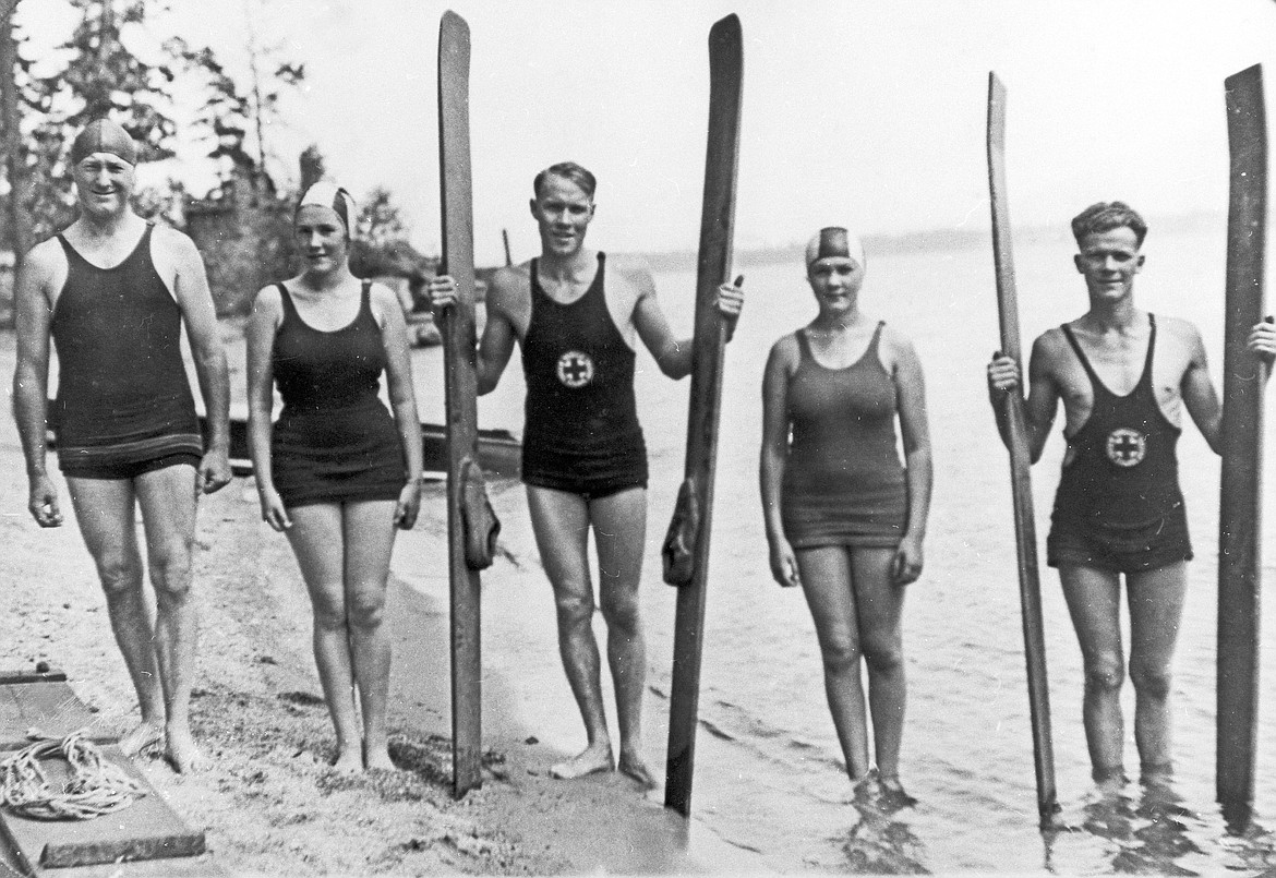 Father Jack Finney, left, and four of his children — Mary, John, Harriett and Walter — display their wakeboard and water skis in about 1931.