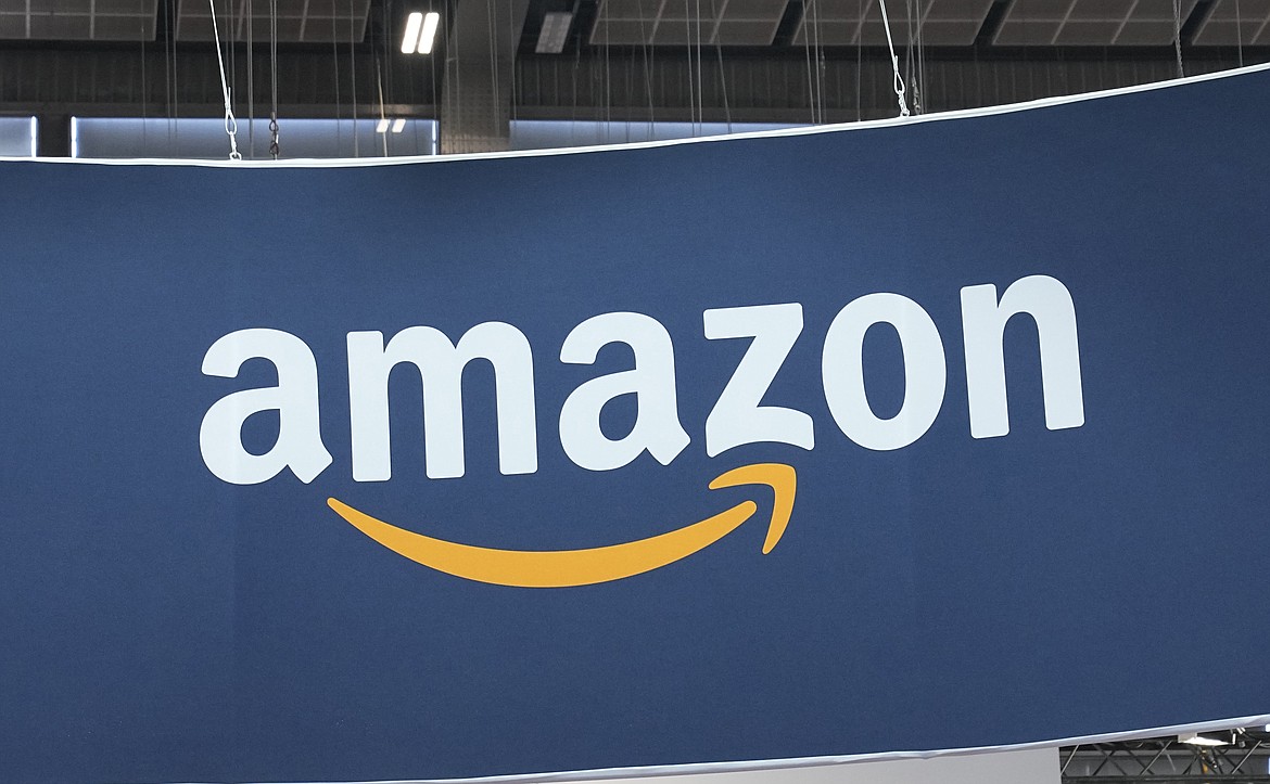 The Amazon logo is photographed at the Vivatech show in Paris, on June 15, 2023. Amazon says, Wednesday, March 27, 2024, its investing another $2.75 billion in the Artificial intelligence startup Anthropic, bringing its total investment in the company to $4 billion. The investment will give Amazon a minority stake in San Francisco-based Anthropic, which is a rival to OpenAI, the maker of the popular chatbot ChatGPT. (AP Photo/Michel Euler, File)