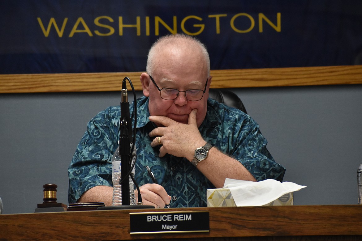 Ephrata Mayor Bruce Reim listens as city staff and council members discuss a possible solution to noise disruptions from large vehicles passing through town. Reim is slated to be on the panel at tonight’s 6 p.m. We are Ephrata Town Hall at the Ephrata High School Performing Arts Center. Entry is free and the public is encouraged to attend.