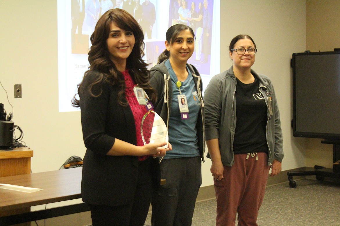 From left, Director of Emergency Services Rebecca Suarez and nurses Amanda Martinez and Courtney Koehn are recognized for the “Heroes of Healthcare” award given to the hospital’s sepsis team.