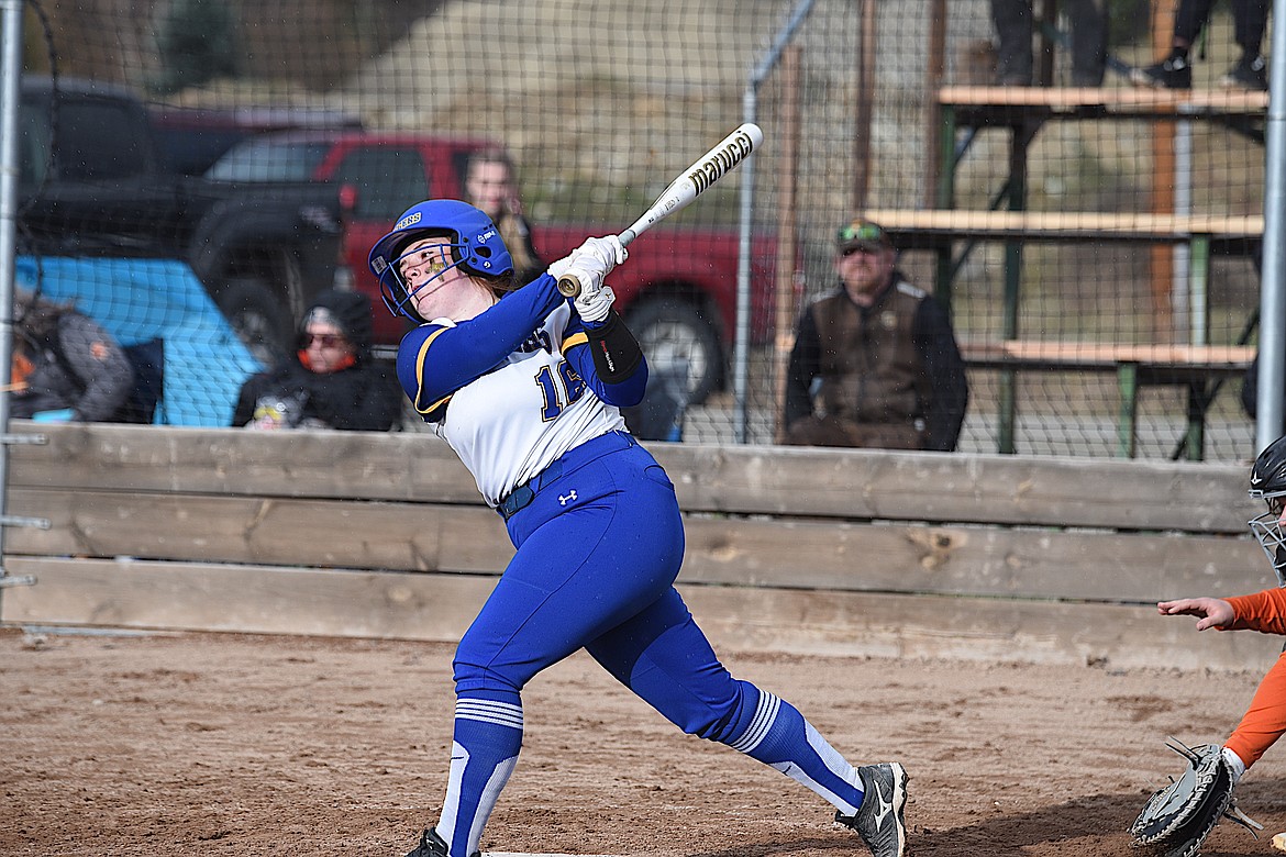 Libby's Jacey Wilson takes a big swing on Thursday, March 28, against Eureka at Remp Field in Libby. The Loggers won 12-2 in six innings. (Scott Shindledecker/The Western News)