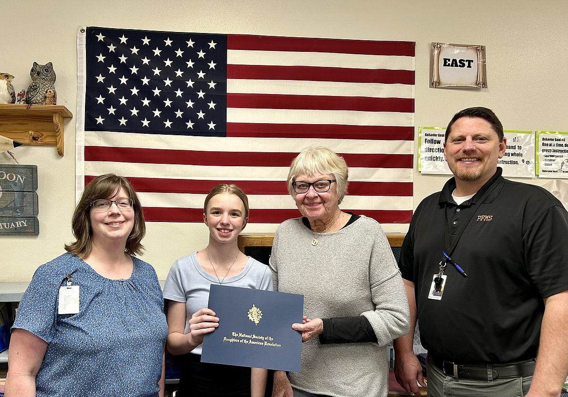 Milli’on Horfelt of Post Falls Middle School is the sixth grade winner of the Pleasantview Chapter of the Daughters of the American Revolution's American History Essay Contest. From left: Sally Holtz, Milli’on Horfelt, Vicki Horfelt and Mark Mason.