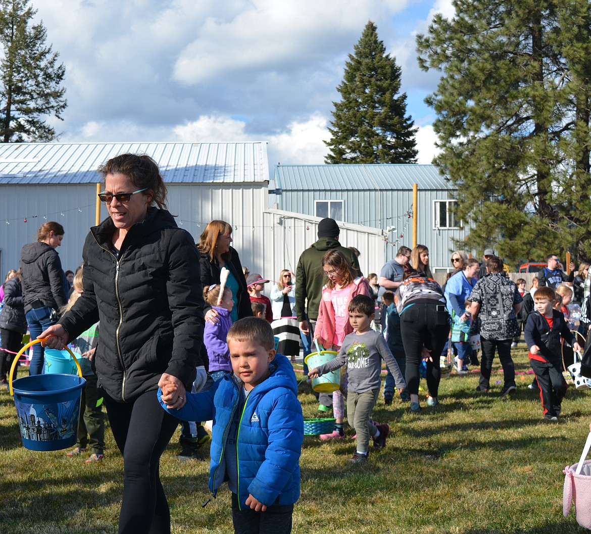 Families came out in roves for some festive Easter egg hunts Friday at the Hayden Clubhouse.