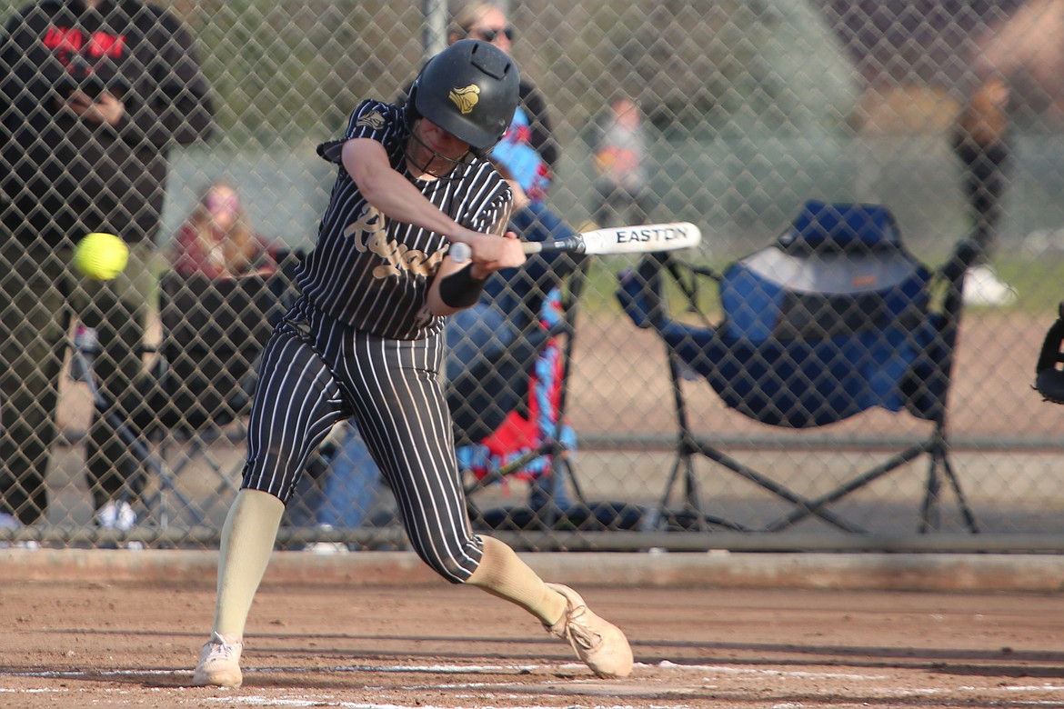 Royal senior Raegan Wardenaar swings at a pitch during the second game of Royal’s doubleheader against Eastmont. Wardenaar went four-for-four at the plate in the second game of the doubleheader.