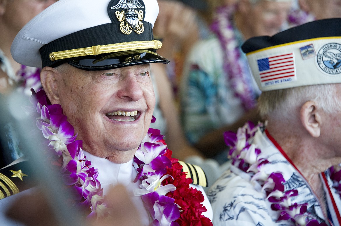 Lou Conter, an Arizona crewman, attends ceremonies for the 75th anniversary of the Japanese attack on Pearl Harbor, Dec. 7, 2016, in Honolulu. Conter, the last living survivor of the USS Arizona battleship that exploded and sank during the Japanese bombing of Pearl Harbor, died on Monday, April 1, 2024, following congestive heart failure, his daughter said. He was 102. (Craig T. Kojima/Honolulu Star-Advertiser via AP, Pool, File)