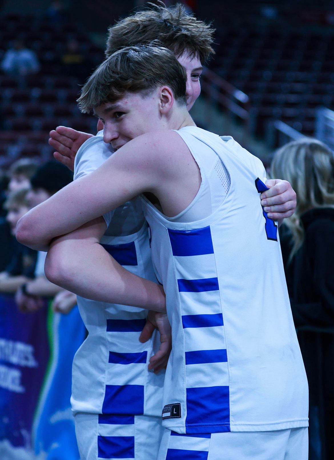 CADEN SIMMONS/Special to The Press
Caden Simmons, a freshman at Lake City High "who is discovering his passion with photography," shared some photos from the recent state high school boys basketball tournament. In this shot, Logan Orchard, right, of Coeur d'Alene hugs teammate Caden Symons after the Vikings defeated Lake City in a first-round game at the Ford Idaho Center in Nampa.